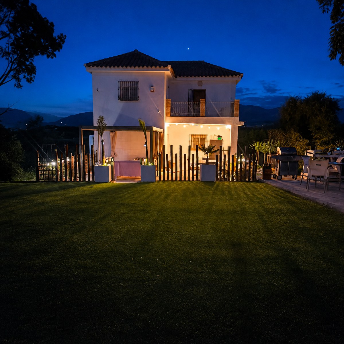 The Ridge residence illuminated at dusk near Pizarra, Málaga